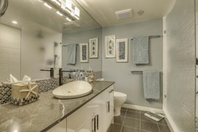 A bathroom with gray color tones